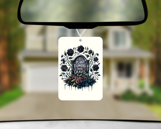 plant flowers over graves air freshener